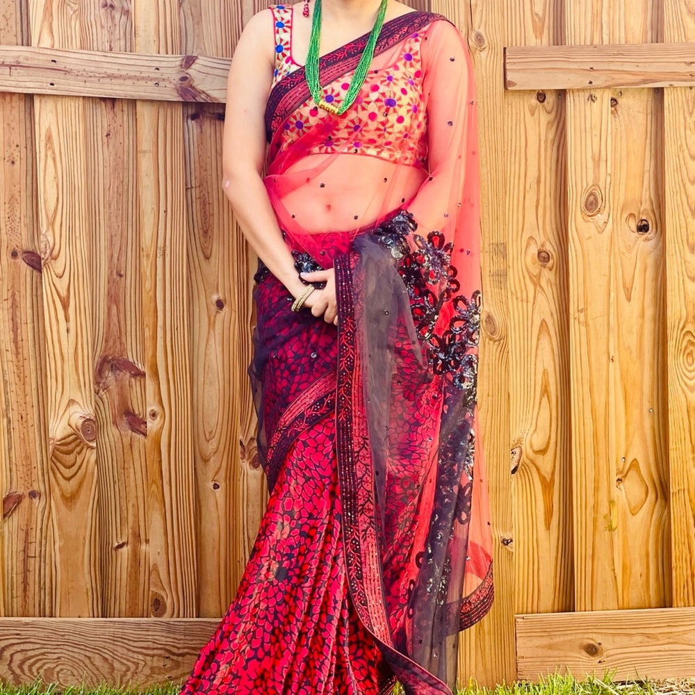Elegant Red and Black Saree only.